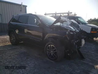 2018 Jeep Grand Cherokee Laredo E with VIN 1C4RJFAG5JC487487, listed as a Copart auction lot 61838185 with 54,297 mi miles and Salvage title. Bid and sale history available at DreamBid. Image 4.