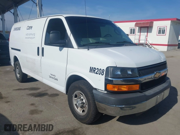 2016 Chevrolet Express Cargo Van with VIN 1GCWGAFF0G1323959, listed as a IAAI auction lot 42172260 with 211,384 mi miles. Bid and sale history available at carsss.com. Image 1.
