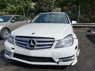 2012 Mercedes-Benz C with VIN WDDGF8BB9CR230328, listed as a IAAI auction lot 42024792 with 129,739 mi miles. Bid and sale history available at carsss.com. Image 12.