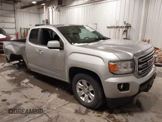 2017 GMC Canyon z VIN 1GTH6CEAXH1198449, wystawiony jako IAAI lot #41241046 z przebiegiem 71 418 mil mil oraz . Historia ofert i sprzedaży dostępna na DreamBid. Obrazek 1.