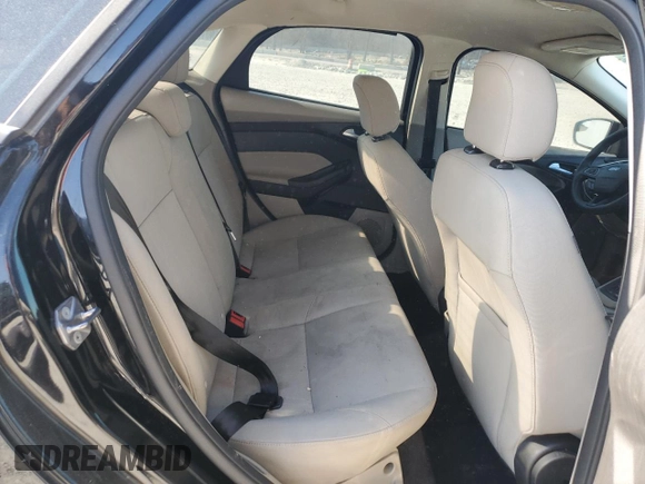 2017 Ford Focus SE with VIN 1FADP3F26HL331253, listed as a Copart auction lot 50869865 with 60,776 mi miles and Salvage title. Bid and sale history available at DreamBid. Image 10.
