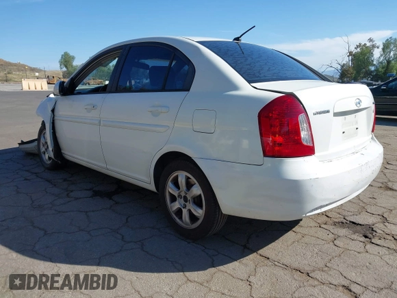 2006 Hyundai Accent GLS with VIN KMHCN46C36U040545, listed as a IAAI auction lot 42021545 with 224,058 mi miles. Bid and sale history available at carsss.com. Image 3.
