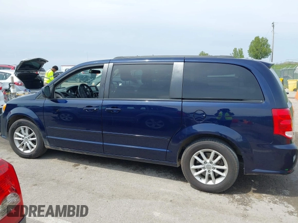 2015 Dodge Grand Caravan SXT with VIN 2C4RDGCG7FR524712, listed as a IAAI auction lot 41956063 with 111,144 mi miles and . Bid and sale history available at DreamBid. Image 14.