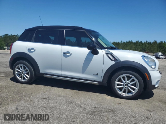 2016 MINI Countryman S with VIN WMWZC5C51GWU00690, listed as a Copart auction lot 55077095 with 104,176 mi miles and Salvage title. Bid and sale history available at DreamBid. Image 4.