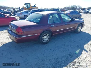 2006 Mercury Grand Marquis LS Premium with VIN 2MEFM75V06X622375, listed as a IAAI auction lot 41686035 with 165,495 mi miles. Bid and sale history available at carsss.com. Image 4.