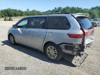 2016 Toyota Sienna XLE with VIN 5TDYK3DC0GS752355, listed as a Copart auction lot 61857925 with 146,949 mi miles and Salvage title. Bid and sale history available at DreamBid. Image 2.