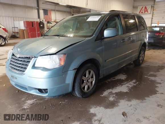 2010 Chrysler Town & Country Touring with VIN 2A4RR5D12AR284617, listed as a IAAI auction lot 41684030 with 199,414 mi miles. Bid and sale history available at carsss.com. Image 2.