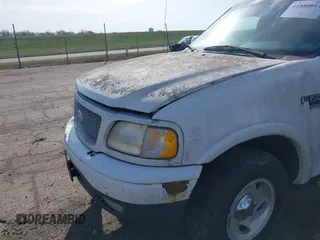1999 Ford F-150 XL with VIN 2FTRX18L7XCA69231, listed as a IAAI auction lot 41880011 with 1 mi miles. Bid and sale history available at carsss.com. Image 6.