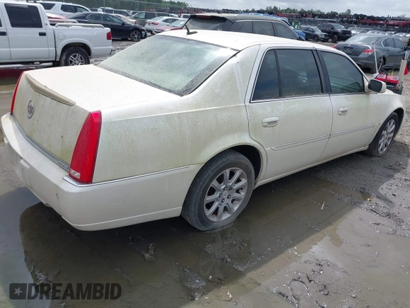2008 Cadillac DTS 1SD z VIN 1G6KD57Y28U112764, wystawiony jako IAAI lot #41953240 z przebiegiem Nie podano mil oraz . Historia ofert i sprzedaży dostępna na DreamBid. Obrazek 4.