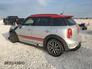 2016 MINI Countryman John Cooper Works with VIN WMWXD1C59GWT97602, listed as a Copart auction lot 52898605 with 141,749 mi miles and Salvage Title. Bid and sale history available at DreamBid. Image 2.
