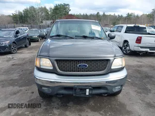2003 Ford F-150 XLT with VIN 1FTRW08L63KA37275, listed as a IAAI auction lot 41875128 with 133,257 mi miles. Bid and sale history available at carsss.com. Image 12.