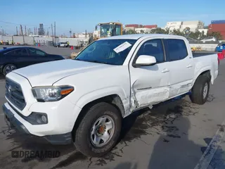 2017 Toyota Tacoma SR with VIN 5TFAX5GN4HX092764, listed as a IAAI auction lot 41708434 with 114,607 mi miles. Bid and sale history available at carsss.com. Image 2.