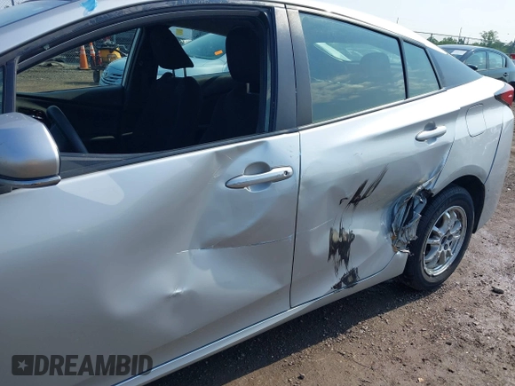 2022 Toyota Prius L Eco z VIN JTDKAMFU2N3165805, wystawiony jako IAAI lot #42428676 z przebiegiem 435 471 mil mil oraz . Historia ofert i sprzedaży dostępna na DreamBid. Obrazek 6.