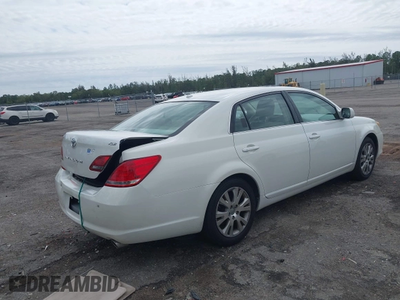 2010 Toyota Avalon XL with VIN 4T1BK3DB8AU354533, listed as a IAAI auction lot 41802797 with 117,956 mi miles and . Bid and sale history available at carsss.com. Image 4.