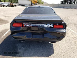 2011 Dodge Challenger z VIN 2B3CJ4DGXBH604602, wystawiony jako Copart lot #60917935 z przebiegiem Nie podano mil oraz Szkoda całkowita • Salvage title. Historia ofert i sprzedaży dostępna na DreamBid. Obrazek 6.