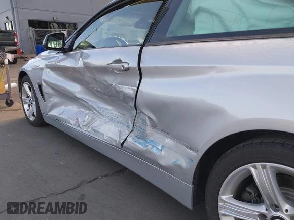 2015 BMW 4 Series 428i with VIN WBA3N7C52FK222743, listed as a IAAI auction lot 41602525 with 81,661 mi miles and . Bid and sale history available at DreamBid. Image 12.