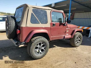 2002 Jeep Wrangler Sahara with VIN 1J4FA59S92P708647, listed as a Copart auction lot 74851654 with 131,794 mi miles and Salvage Title. Bid and sale history available at carsss.com. Image 3.