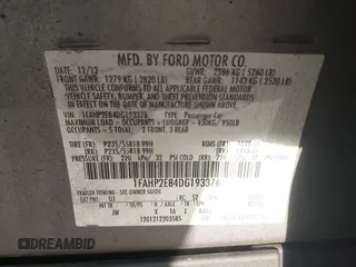 2013 Ford Taurus SEL z VIN 1FAHP2E84DG193376, wystawiony jako IAAI lot #41661721 z przebiegiem 136 341 mil mil oraz . Historia ofert i sprzedaży dostępna na DreamBid. Obrazek 9.