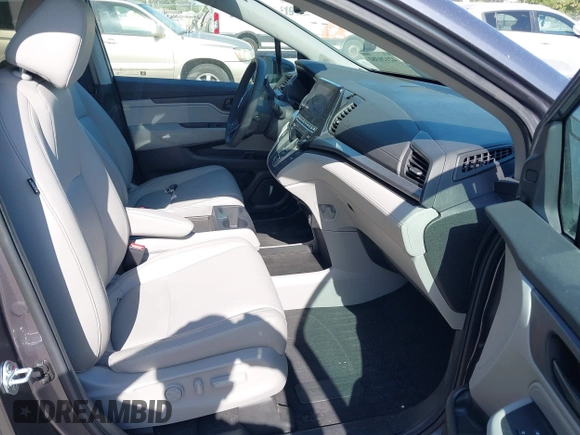 2024 Honda Odyssey EX-L with VIN 5FNRL6H65RB069145, listed as a IAAI auction lot 42120381 with 15,207 mi miles and . Bid and sale history available at DreamBid. Image 5.