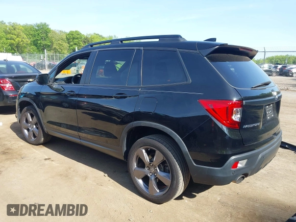 2021 Honda Passport Touring z VIN 5FNYF8H96MB014947, wystawiony jako IAAI lot #42150399 z przebiegiem 47 499 mil mil oraz . Historia ofert i sprzedaży dostępna na DreamBid. Obrazek 3.