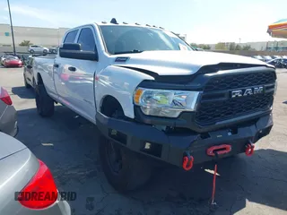 2021 Ram 2500 Tradesman with VIN 3C6UR5HJ5MG606694, listed as a IAAI auction lot 41818747 with 93,665 mi miles and . Bid and sale history available at DreamBid. Image 1.