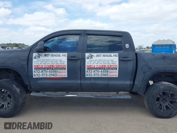 2013 Toyota Tundra 4WD Truck with VIN 5TFDW5F14DX279527, listed as a IAAI auction lot 41594899 with 212,973 mi miles. Bid and sale history available at carsss.com. Image 14.