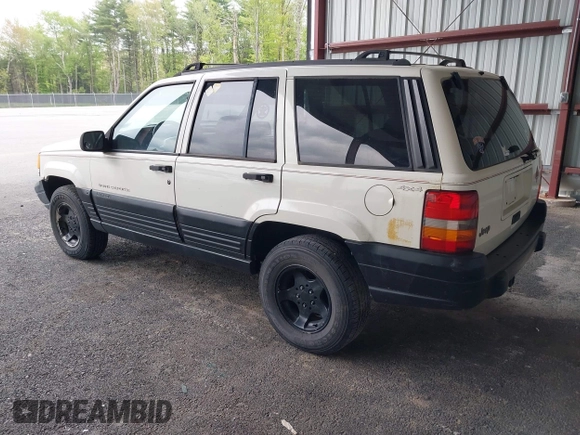 1997 Jeep Grand Cherokee Laredo z VIN 1J4GZ58S7VC737980, wystawiony jako IAAI lot #42256142 z przebiegiem 188 958 mil mil oraz . Historia ofert i sprzedaży dostępna na DreamBid. Obrazek 3.