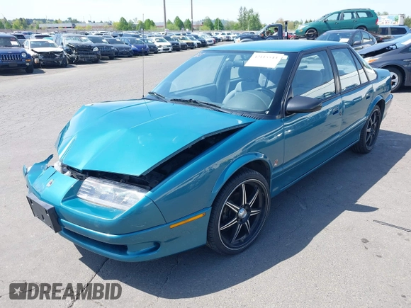 1995 Saturn SL with VIN 1G8ZK5277SZ320711, listed as a IAAI auction lot 42115543 with 77,558 mi miles and . Bid and sale history available at DreamBid. Image 17.