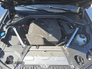 2024 BMW X4 xDrive30i z VIN 5UX33DT06R9U88255, wystawiony jako Copart lot #56604545 z przebiegiem 30 544 mil mil oraz Tytuł czysty. Historia ofert i sprzedaży dostępna na DreamBid. Obrazek 11.