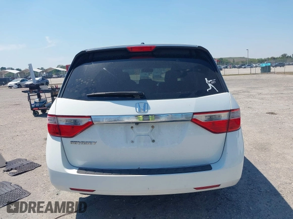 2012 Honda Odyssey EX-L with VIN 5FNRL5H61CB019215, listed as a IAAI auction lot 41837320 with 248,498 mi miles and . Bid and sale history available at DreamBid. Image 17.