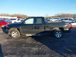 2017 Chevrolet Silverado 1500 LT with VIN 1GCVKREC8HZ331875, listed as a IAAI auction lot 40960777 with 147,157 mi miles. Bid and sale history available at carsss.com. Image 13.