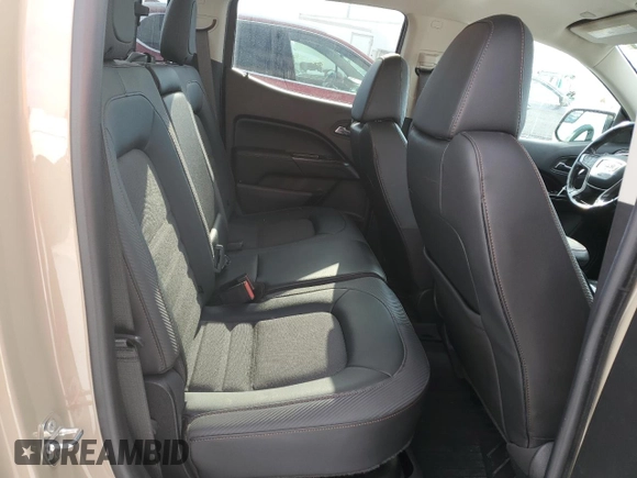 2021 GMC Canyon 4WD AT4 z VIN 1GTG6FEN8M1157828, wystawiony jako Copart lot #88392435 z przebiegiem 45 252 mil mil oraz Szkody całkowita. Historia ofert i sprzedaży dostępna na DreamBid. Obrazek 10.