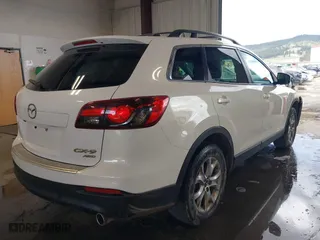 2015 Mazda CX-9 Touring with VIN JM3TB3CV0F0466205, listed as a IAAI auction lot 41871935 with 130,313 mi miles. Bid and sale history available at carsss.com. Image 4.