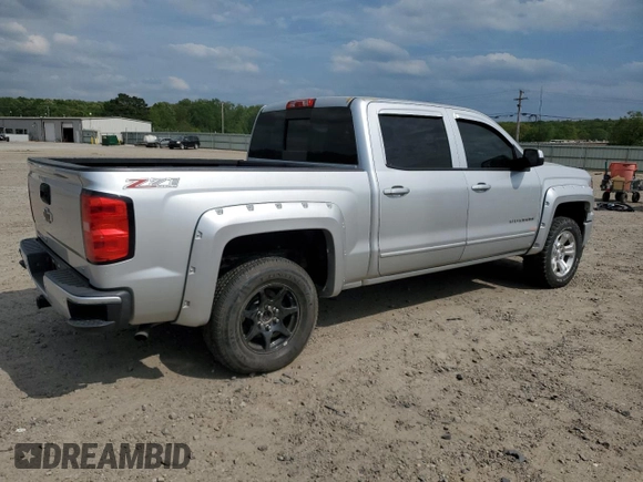 2015 Chevrolet Silverado 1500 LT with VIN 3GCUKREC9FG147988, listed as a Copart auction lot 53784635 with 218,260 mi miles and Salvage Title. Bid and sale history available at DreamBid. Image 3.