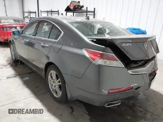 2009 Acura TL Tech with VIN 19UUA86559A006482, listed as a IAAI auction lot 41531597 with 203,255 mi miles. Bid and sale history available at carsss.com. Image 3.
