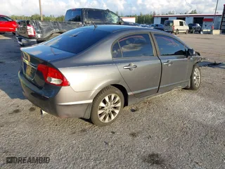 2010 Honda Civic Sdn EX with VIN 19XFA1F80AE026715, listed as a IAAI auction lot 41887154 with 128,272 mi miles. Bid and sale history available at carsss.com. Image 4.