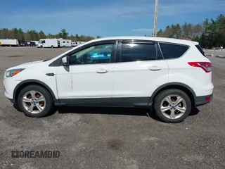 2013 Ford Escape SE with VIN 1FMCU0GXXDUA73875, listed as a IAAI auction lot 42164115 with 195,712 mi miles and . Bid and sale history available at carsss.com. Image 14.