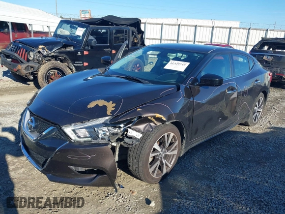 2016 Nissan Maxima SL with VIN 1N4AA6AP1GC448472, listed as a IAAI auction lot 41329749 with 152,644 mi miles and . Bid and sale history available at DreamBid. Image 6.