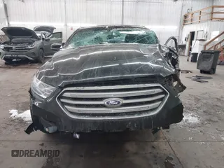 2015 Ford Taurus SEL with VIN 1FAHP2E81FG181897, listed as a IAAI auction lot 41598004 with Not Provided miles and . Bid and sale history available at carsss.com. Image 13.