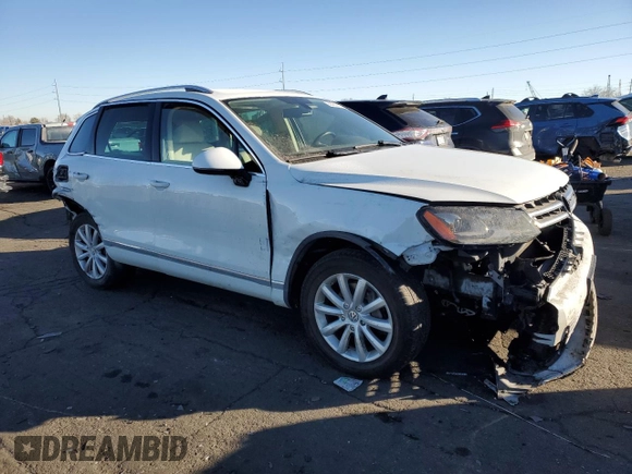 2012 Volkswagen Touareg Exec with VIN WVGEF9BP7CD009869, listed as a Copart auction lot 88099145 with Not Provided miles and Salvage Title. Bid and sale history available at DreamBid. Image 4.