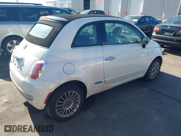 2012 FIAT 500 Lounge z VIN 3C3CFFER7CT119147, wystawiony jako IAAI lot #41431509 z przebiegiem 140 084 mil mil oraz . Historia ofert i sprzedaży dostępna na DreamBid. Obrazek 4.