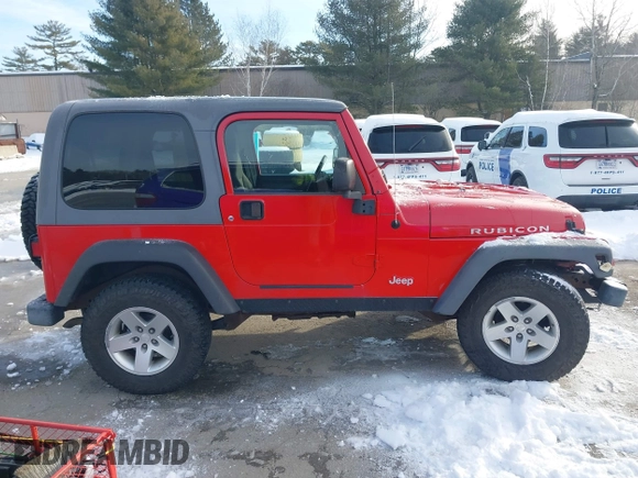 2005 Jeep Wrangler Rubicon with VIN 1J4FA69S25P316085, listed as a IAAI auction lot 41503034 with 57,252 mi miles. Bid and sale history available at carsss.com. Image 13.
