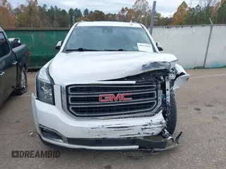 2019 GMC Yukon XL SLT with VIN 1GKS2GKC7KR165419, listed as a IAAI auction lot 40977930 with 167,195 mi miles and . Bid and sale history available at carsss.com. Image 12.
