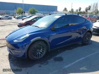 2021 Tesla Model Y Long Range with VIN 5YJYGDEE3MF218743, listed as a IAAI auction lot 41831363 with 78,622 mi miles. Bid and sale history available at carsss.com. Image 2.