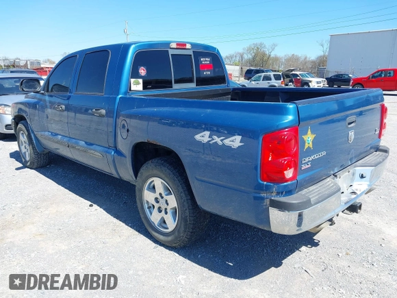 2005 Dodge Dakota SLT with VIN 1D7HW48N05S339156, listed as a IAAI auction lot 41862684 with 158,796 mi miles and . Bid and sale history available at DreamBid. Image 3.