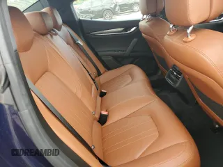 2018 Maserati Ghibli z VIN ZAM57XSA5J1287424, wystawiony jako Copart lot #71215154 z przebiegiem 20 029 mil mil oraz Szkoda całkowita • Salvage title. Historia ofert i sprzedaży dostępna na DreamBid. Obrazek 10.