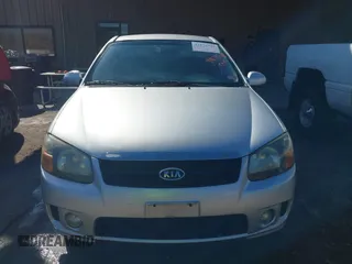 2009 Kia Spectra EX with VIN KNAFE221295026738, listed as a IAAI auction lot 41871548 with 238,130 mi miles. Bid and sale history available at carsss.com. Image 6.