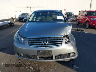 2006 Infiniti M z VIN JNKAY01E56M107083, wystawiony jako IAAI lot #41443347 z przebiegiem 162 191 mil mil oraz . Historia ofert i sprzedaży dostępna na DreamBid. Obrazek 12.