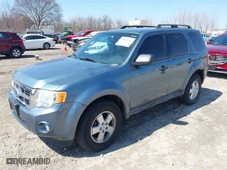 2010 Ford Escape XLT with VIN 1FMCU0DGXAKD37821, listed as a IAAI auction lot 42002767 with 169,557 mi miles. Bid and sale history available at carsss.com. Image 2.