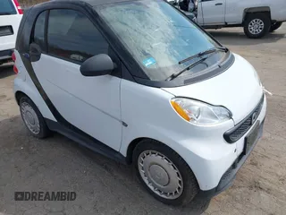 2013 Smart fortwo Pure with VIN WMEEJ3BAXDK709587, listed as a IAAI auction lot 41795485 with 54,997 mi miles. Bid and sale history available at carsss.com. Image 1.
